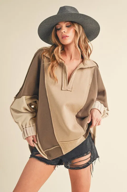 AEMI & Co. Stylish Oversized Hooded Lallie Sweatshirt with Exposed Seam