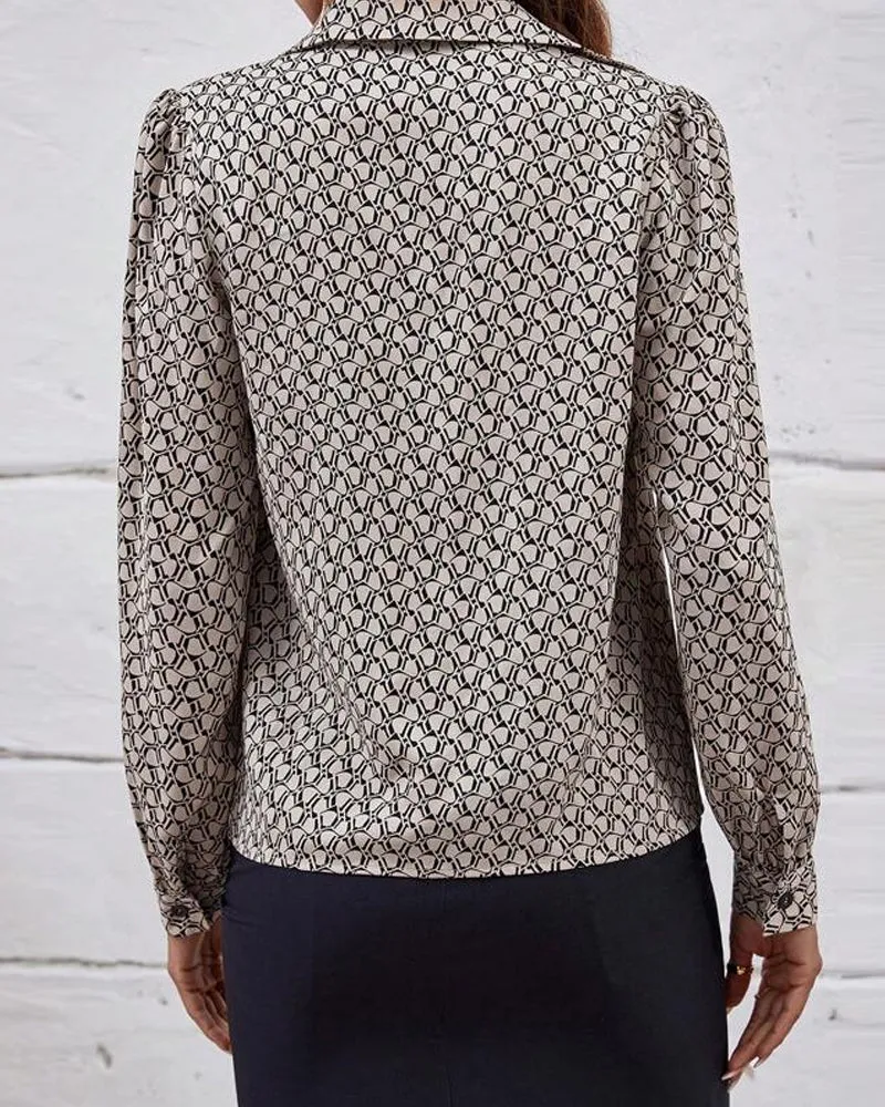 Elegant blouse with geometric print lapel