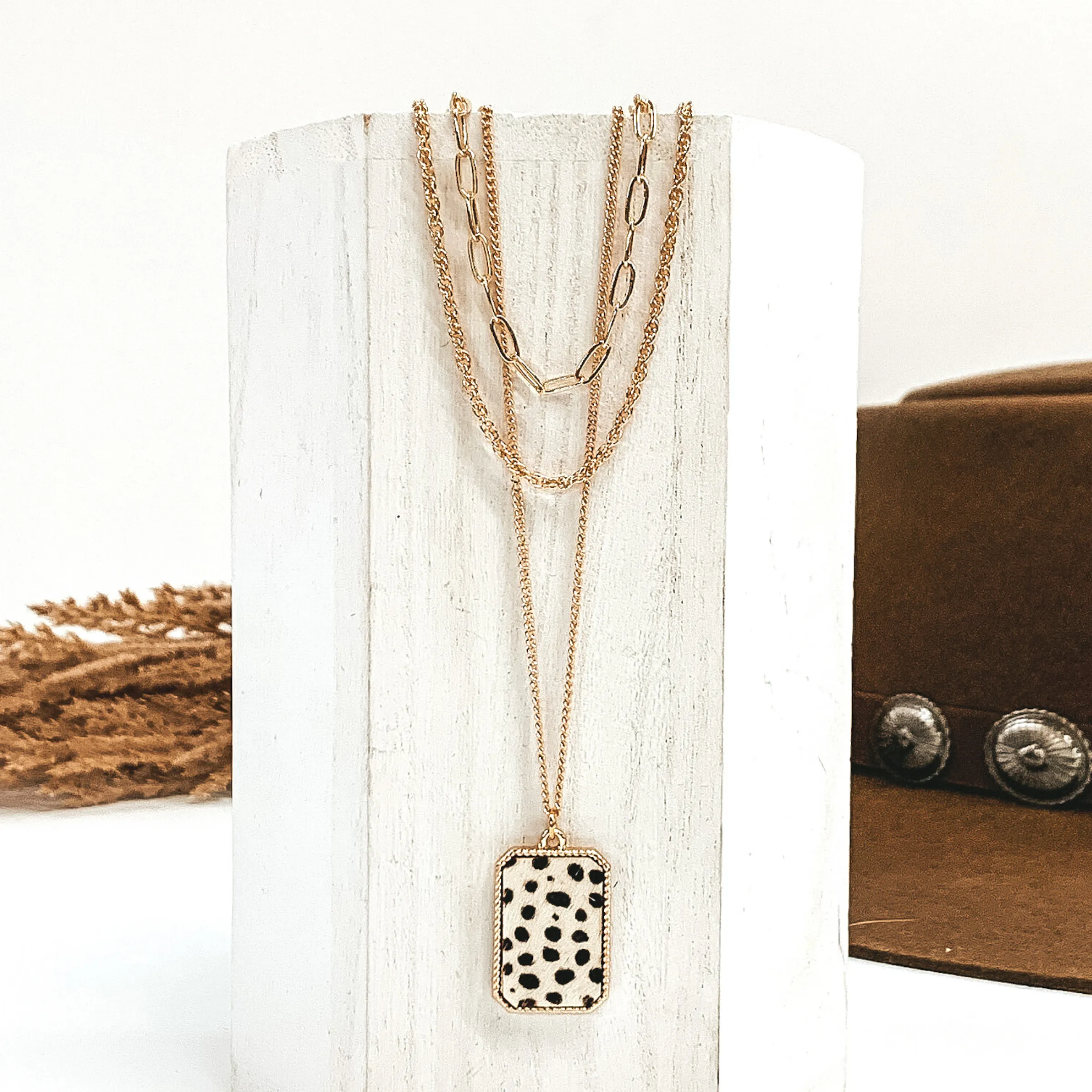 Gold Multi Chain Necklace with a Rectangle Pendant in White Dotted Print